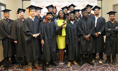 The 2017 graduating class of Tropicana's Pre-Apprenticeship Training Program and Mitzie Hunter (centre), Minister of Education.