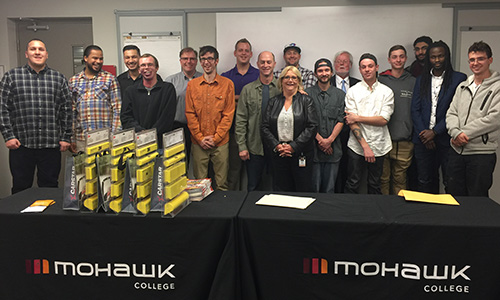 The 15 students who successfully graduated from Mohawk College’s Auto Body Collision and Damage Repairer program.